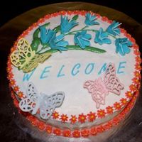 Welcome I made this cake for our new neighbors who just moved in. Bluebells are BC with RI stamens, butterflies are RI too. Thanks for looking!