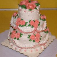 Mini Wedding Cake French Vanilla cake with all BC decorations. I made this cake for practice. I used 6", 4,5", and 3" cake pans and it's...