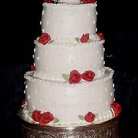 Valentine's Wedding Cake This was my first wedding cake. It was a small wedding and red/valentine's was the theme.Cake was done in Buttercream icing with...