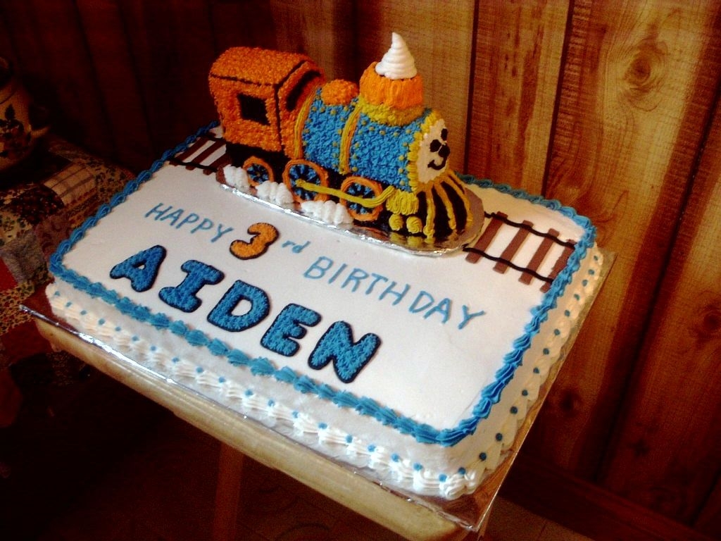 Choo Choo Train Cake I made this for a friends little boy. Used the Wilton stand up choo choo train pan.