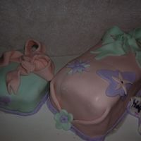 Presents Chocolate Cake, Chocolate Frosting and fondant covering and bow.