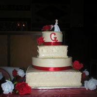 Wedding Cake White cake with raspberry filling and bc frosting.