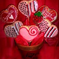 First_Bouquet.jpg My very first cookie bouquet! (of course I did not come up with all the designs)