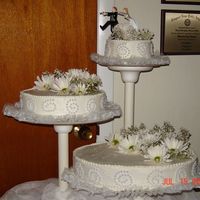 Co-Workers Son Wedding 07/15/06 I did this cake as a last minute favor for a co-worker. I only charged them $65 for the cake because of the reason that her son was getting...