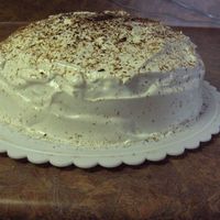 White Cake White cake with egg white whipped icing, very fluffy! On top is shaved dark chocolate.