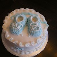 Imgp0375.jpg 8 inch cake. First attempt at making booties.