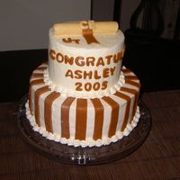 Graduation Cake I made this for a friend's graduation from UT (the school colors are burnt orange and white). The bottom is chocolate cake and the top...