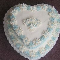 Heart Daisy Cake This Cake was made with Butter Cream Icing and Gum Tex and Fondant Daisies...Real Easy Cake