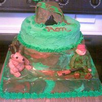 Hunter's 75Th Birthday 10" square cake with 2 stacked round cakes. Used extra cake to sculpt a tent. Just keep playing with buttercream to get the '...