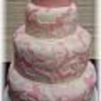 Pink Camouflage With Crown The bride to be loved to hunt and fish. The crown represented the name of the grooms family business.Sorry, this was my first attempt at...