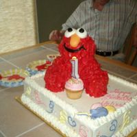 Babies 1St B-Day Cake 3D Elmo on 1/2 sheet cake.