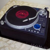 Turntable Birthday Cake Copied the design of the actual turntable the birthday person was getting as a gift. Everyone, especially the recipient, absolutely loved...