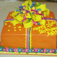 Package Neighbor's daughter's 15th birthday! First bow...needs work. Gotta practice more.