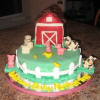 Baby Farm Animals I had a request for a baby farm animals baby shower cake... The cake is covered in MMF with all the animals made of chocolate clay. The...