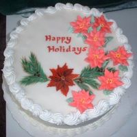 Painted Poisettias Learning how to use royal icing and tried poinsettias along with my painted plaque.