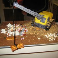 Crane My great nephew is turning 2 and LOVES cranes, as well as dump trucks, bulldozers, etc. But, I HAD to make him a crane. The arm is 3 dowel...