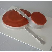 Pots And Pans Cake This groom's cake goes with the monogrammed petit fours, and was for a reception held the day after the wedding. The larger 'pan...