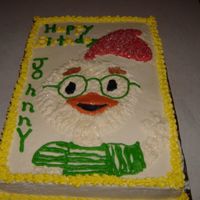 Chicken Little hand drawn chicken little , white sheet cake butter cream icing. It was for my nephew's birthday.