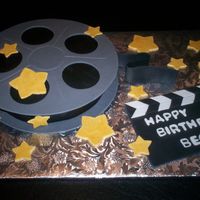 Movie This cake was done for a friends Hollywood party. All dec. are fondant.