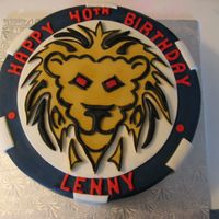 Img_0104.jpg the client has a poker consulting company and he wanted a cake to look like a poker chip and have his logo, the lion, on it..it was really...