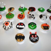Many Halloween Decorated Cupcakes 