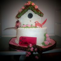 Birdhouse Buttercream birdhouse and cake. Almond cream cheese pound cake. Royal icing roses.