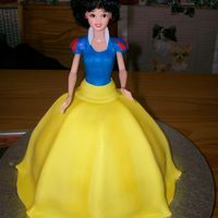 Snow White Fondant covered Snow White. The litte Princess I made the cake for wouldn't eat her and ended up having to throw away the cake a week...