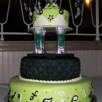 Black And Green 3-tier fondant covered cake inspired by Nicolas Lodge(the bottom tier anyway) for a friends birthday/fashion show