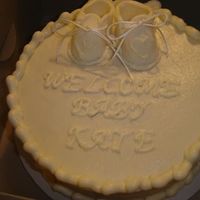 White On White the mom wanted white cake with white frosting and white decorations. I think it is ugly and had a hard time working on it cause it isn'...