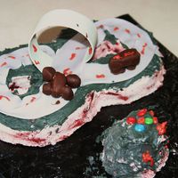 Racetrack! My son made this for his school carnival; cars out of chocolate,track out of fondant! He is 6!