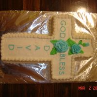 Basic Cross Cake This is a cake I did for a friend's son. The top part of the cross looked bare after I put the words in, so I added roses like I'...