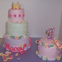 Princess Cake Buttercream frosting and gumpaste accents. The smaller cake is egg free... tiered cake a regular white cake.