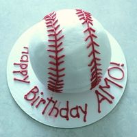 Baseball Cake Covered With Buttercream This is just a small baseball cake I made for my step sons' birthdays! I used the Wilton Ball Pans and covered it with buttercream...