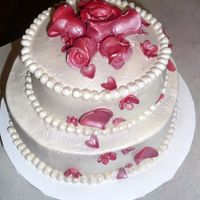 Hearts And Roses Bridal Shower Cake This bridal shower cake is covered with homemade buttercream icing, lightly airbrushed with silver. The hearts, roses and other flowers are...
