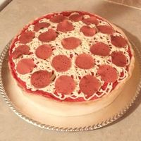Deep Dish Pepperoni Cake This is a strawberry cake with buttercream icing, gum paste "pepperoni", and fondant "crust". I have to give credit to...