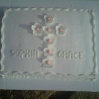 Baptism Cake My client asked for a simple, pretty cake to celebrate their daughter's baptism. I used buttercream frosting, fondant flowers and...