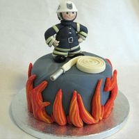 Fireman's Birthday Cake This is a small cake I made for a fireman's 50th birthday. The cake is just 6" and the idea was that it would be just for him. (...