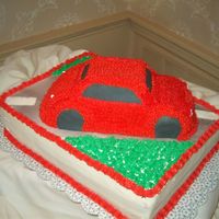 Auto Groom's Cake All buttercream, tires were fondant icing, road was airbrushed. Fun, but those stars were tedious!