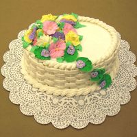 Class 2: 1St Basketweave Cake From the Wilton classes I took last year - my first attempt at basketweave and royal icing flowers.