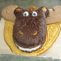 Imgp3515.jpg Canadian Moose for July 1st (Canada Day) Chocolate cake with butter cream icing, and chocolate sugar cookies for the ears.