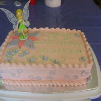Tinkerbell Birthday Cake This is my first square cake. I still have a lot of problems making the buttercream icing smooth.