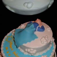 Surprise New Grandma Baby Cake This was my first paid cake, although I haven't gotten the money yet (we will see!). We surprised a co-worker with a baby shower, as...