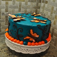 Spring Butterflies An expiremental dummy cake with MMF that didn't turn out but I used anyway. Ha! Candy butterflies, with chocolate icing for the funky...