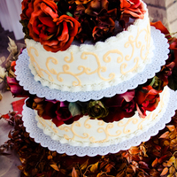 Fall In Love Fall themed Wedding Cake with fake flowers