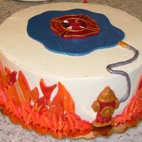 Fire Dept. Cake Used Chocolate Molds for the fire hydrant, and luster dust to make the hose silver. This one was fun!!