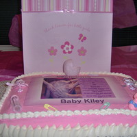 Welcome Baby Kiley Yellow cake with buttercream frosting. Picture and poem is edible image. Cake was made for a co-workers.