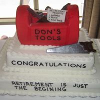 Tool Box Retirement Cake The tool box on top is made out of cake and covered with fondant. The tools were molded out of chocolate and covered with silver luster...