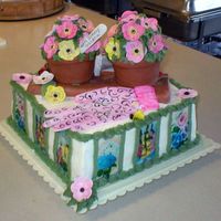 Gardener's Themed This lady was turmming 84 and she loves to garden...the cake 10" WASC/ filling white choc.apricot mousse,BC. The pots are Apricot cake...