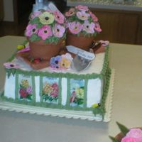 Backside moved when taking pictures, blurred sorry, back of the cake as I was sitting it up, things are not leveled yet...thanks for looking