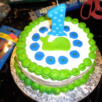 Baby's 1St Birthday This is the top of my little boys first birthday. THe theam was whales. Vanilla buttercream with lemonaid and berry cake.